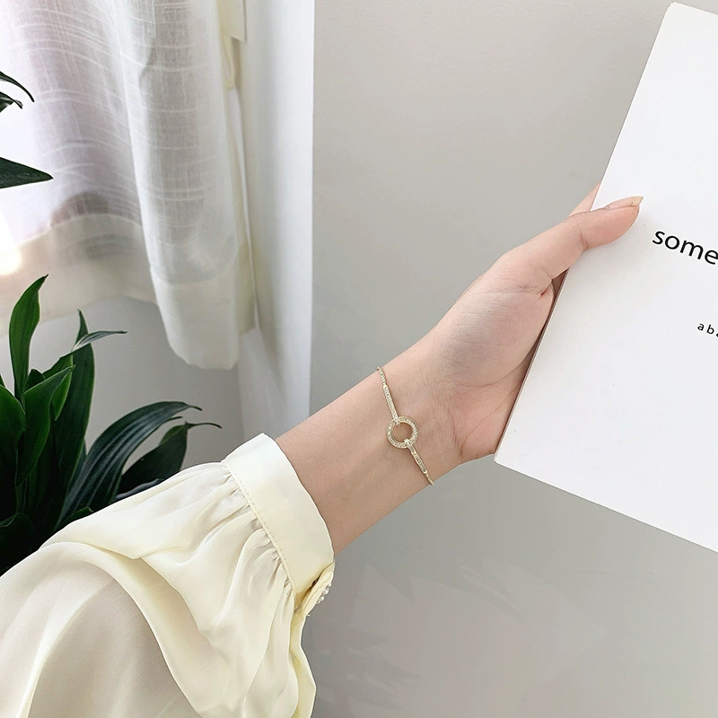 70020000901_1-1.png Minimalist Gold Loop & Zircon Adjustable Bracelet