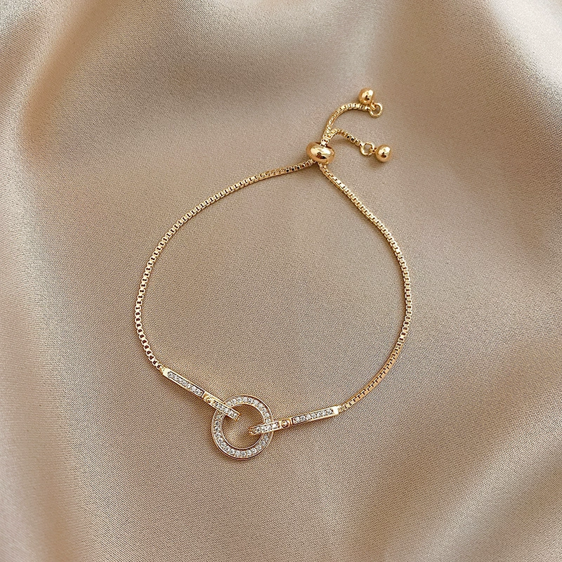 70020000901_3-1.png Minimalist Gold Loop & Zircon Adjustable Bracelet